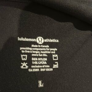 Lululemon Athletica Men’s black with red trim size L 86% Nylon 14% Lycra